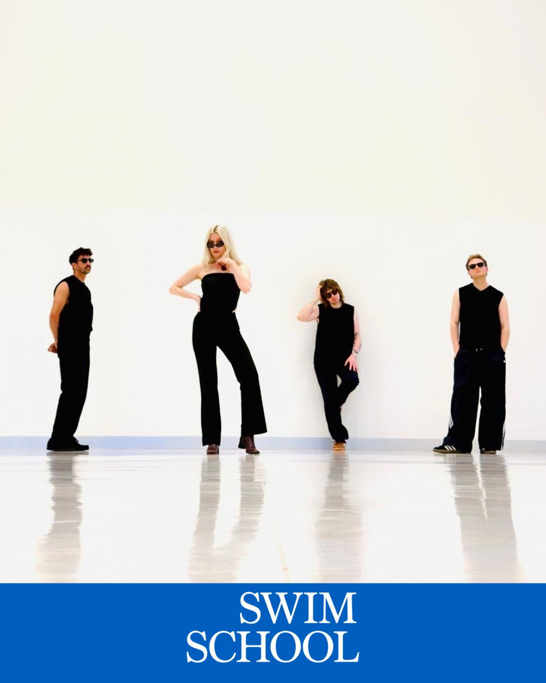 Group of four people in black outfits at Swim School event, Heartland Festival Pitlochry.